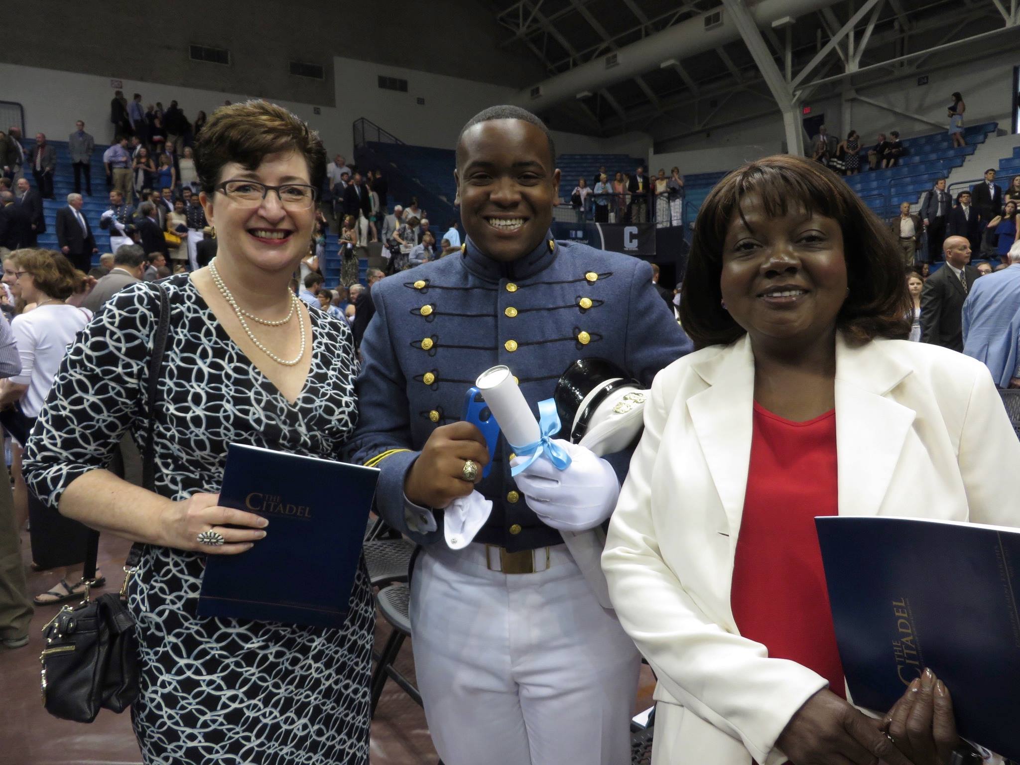 Celebrating with the graduate and his mother.