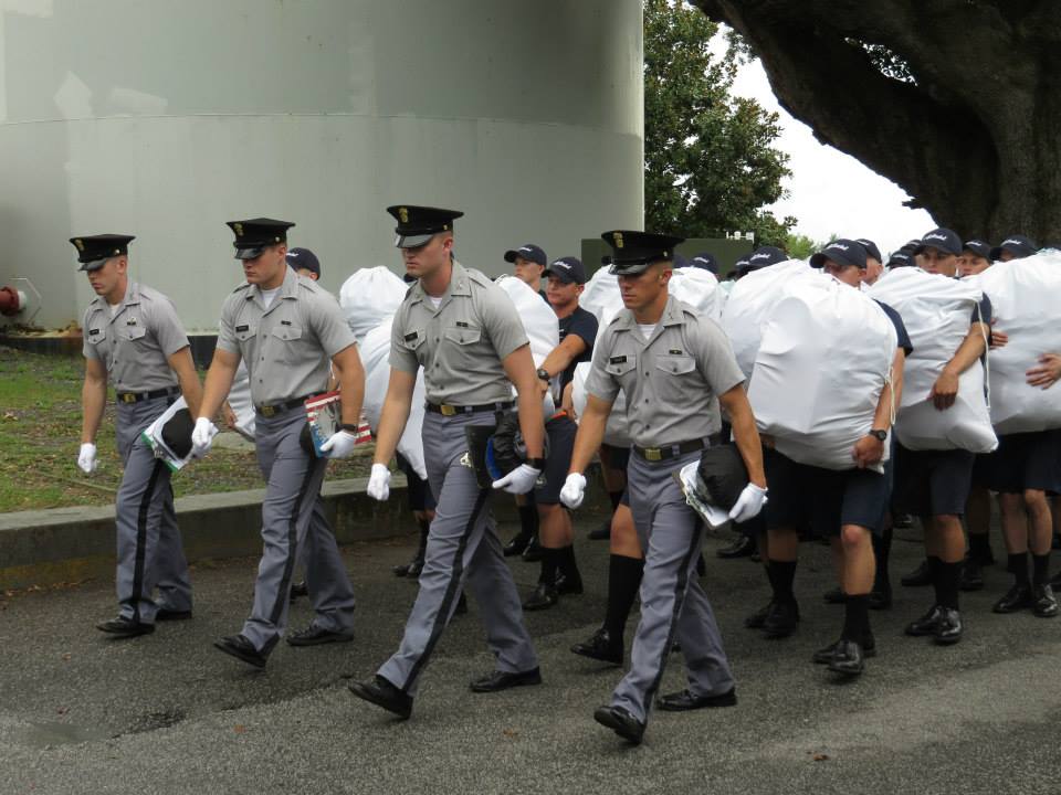 Cadre members lead knobs from the Cadet Store back to their company. August 2015