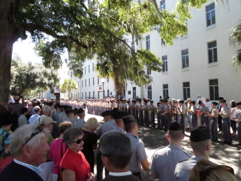 The Class of 2018 lines the street to cheer on the Class of 2015 as they march to the field house to receive their rings. Oct. 2014